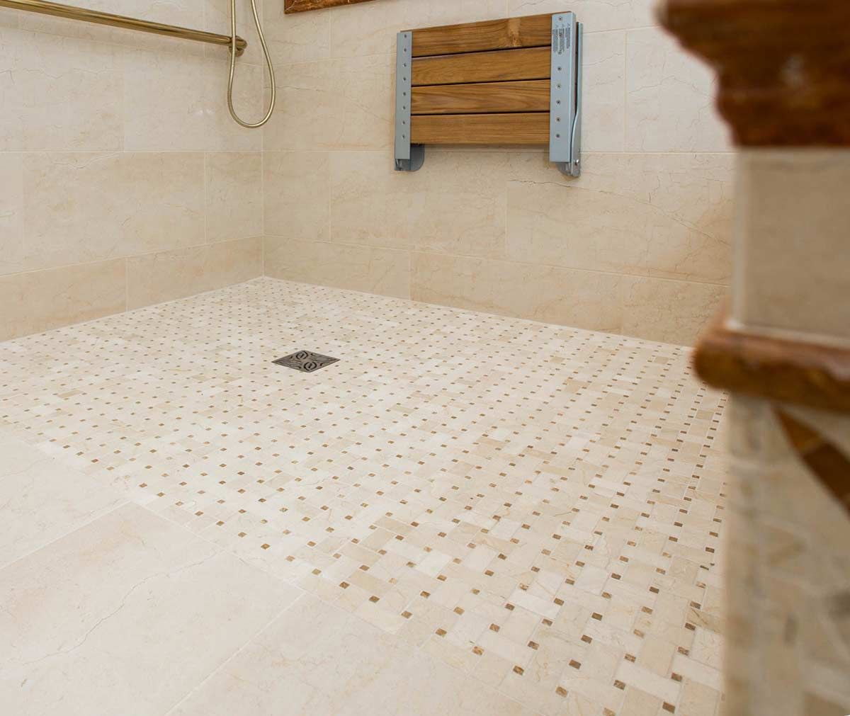 Tiled roll-in shower base with 15 possible drain locations - Innovate Building Solutions