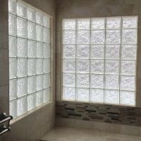 Ceramic tile walls with a 40" x 40" glass block high privacy windows - Innovate Building Solutions