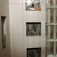 Glass tile niche in a glass block shower using 4 x 8 clear glass blocks - Innovate Building Solutions