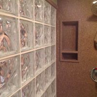 Recessed niche in a solid surface shower wall panel - Innovate Building Solutions