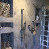 Shampoo and soap niches in a herringbone pattern glass block shower - Innovate Building Solutions