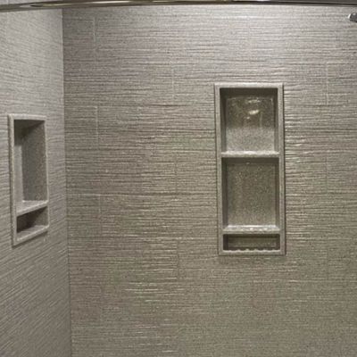 8 inch by 12 inch wavy tile pattern cultured granite wall panels with a extra tall recessed niche - Innovate Building Solutions