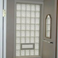 Glass block window using 6 x 8 sized blocks in a bathroom with vinyl window trim - Innovate Building Solutions 