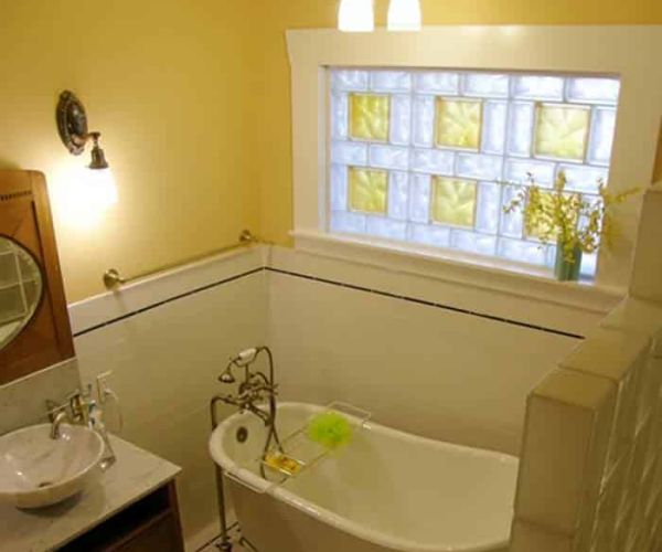 colored and frosted glass block bathroom window using yellow 8 x 8 colored and 4 x 8 clear glass blocks - Innovate Building Solutions 