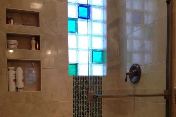 Glass block shower window with blue and green color glass blocks - Columbus Glass Block division Innovate Building Solutions 